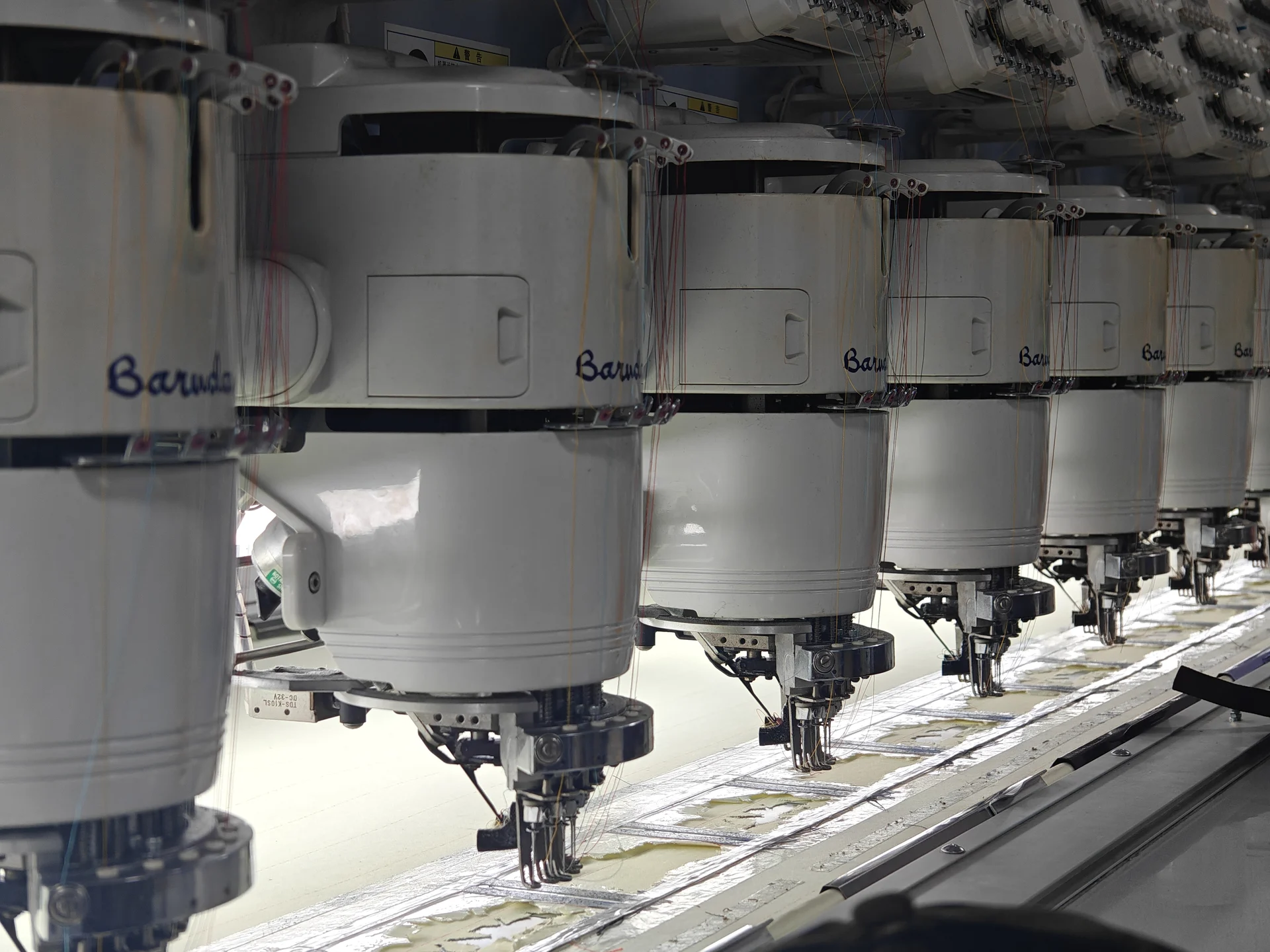 Crownflow Headwear factory equipment and production line in Beijing