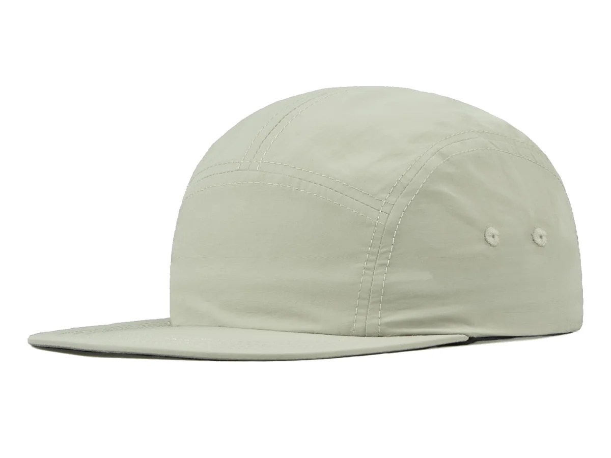 Custom beige 5-panel cap with a flat brim for skate, outdoor and design-led brand programs - Crownflow Headwear